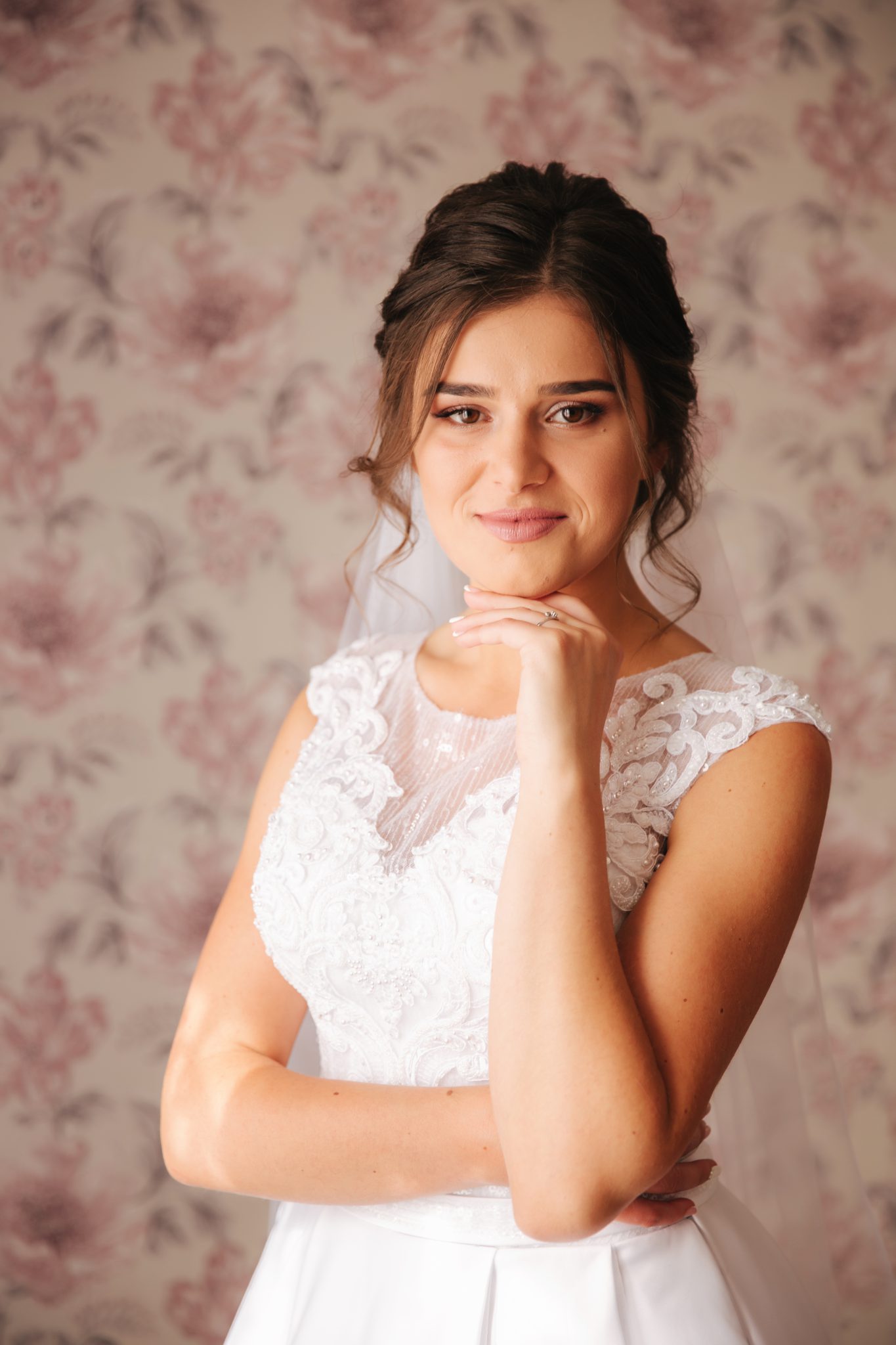 Morning of young bride. Portrait of beautiful girl. White wedding dress.
